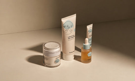 SolRay Beauty cleanser, collagen serum, face cream and eye cream on a beige tabletop.