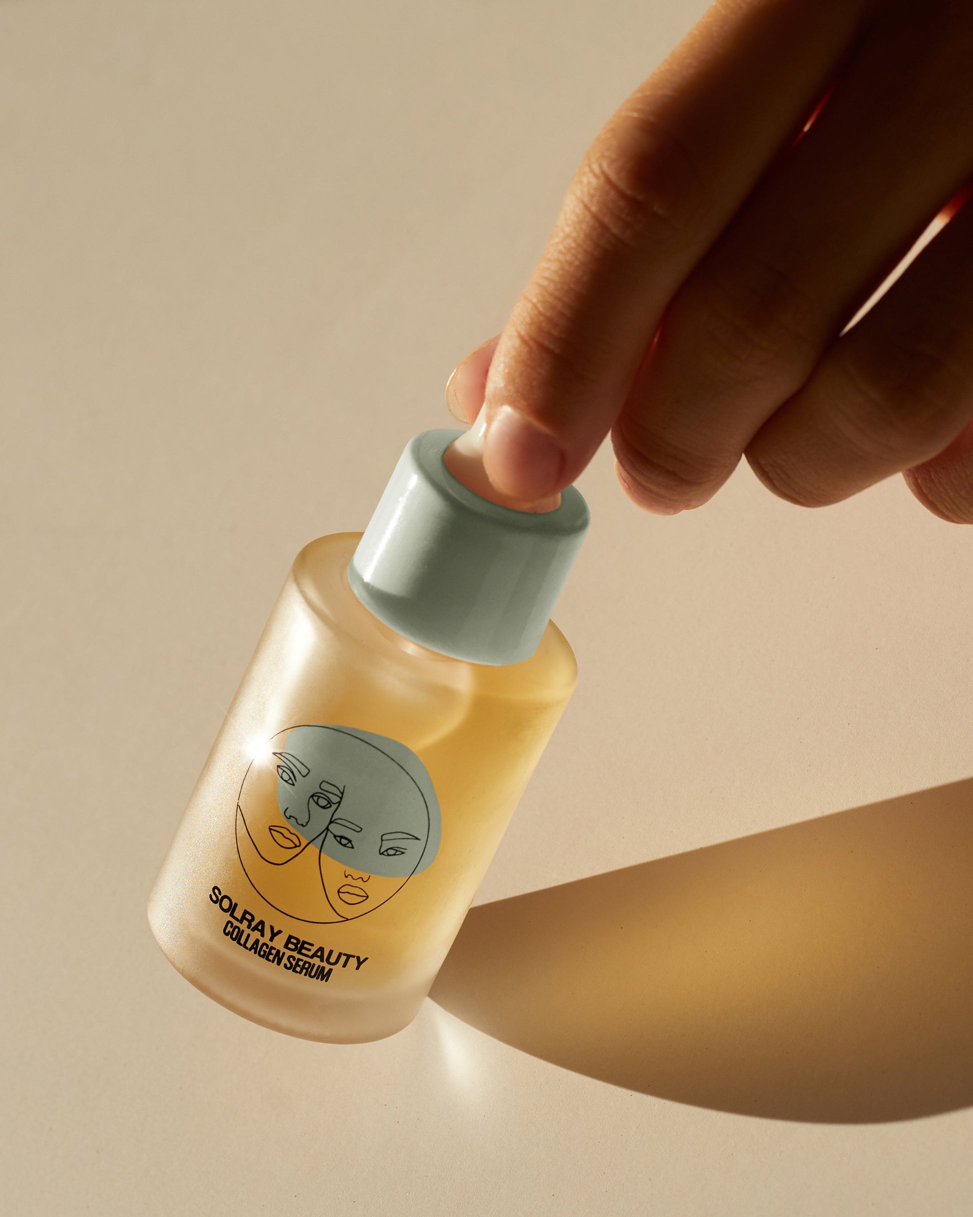 SolRay Beauty's Collagen Serum bottle with the SolRay Beauty logo prominently displayed on the label.