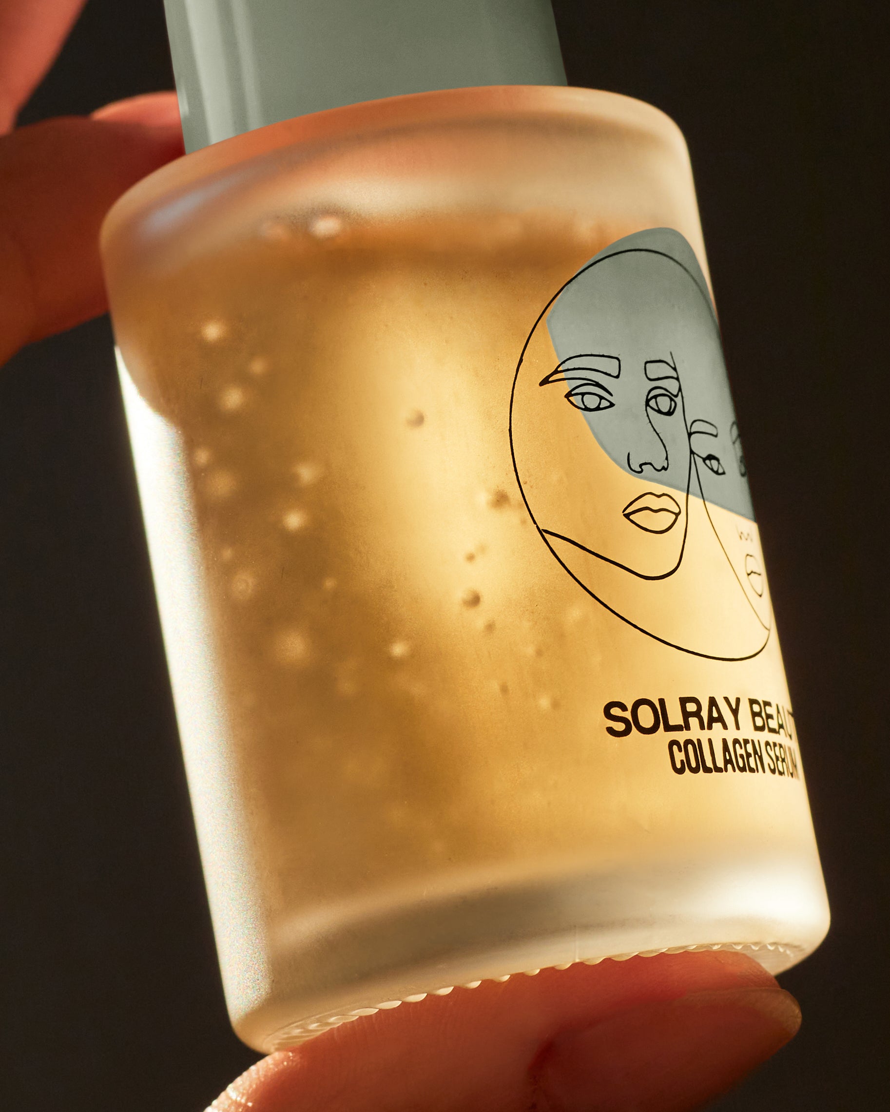 SolRay Beauty's Collagen Serum bottle with the SolRay Beauty logo prominently displayed on the label.